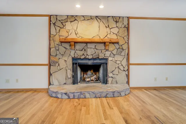 a view of wooden floor and cabinet