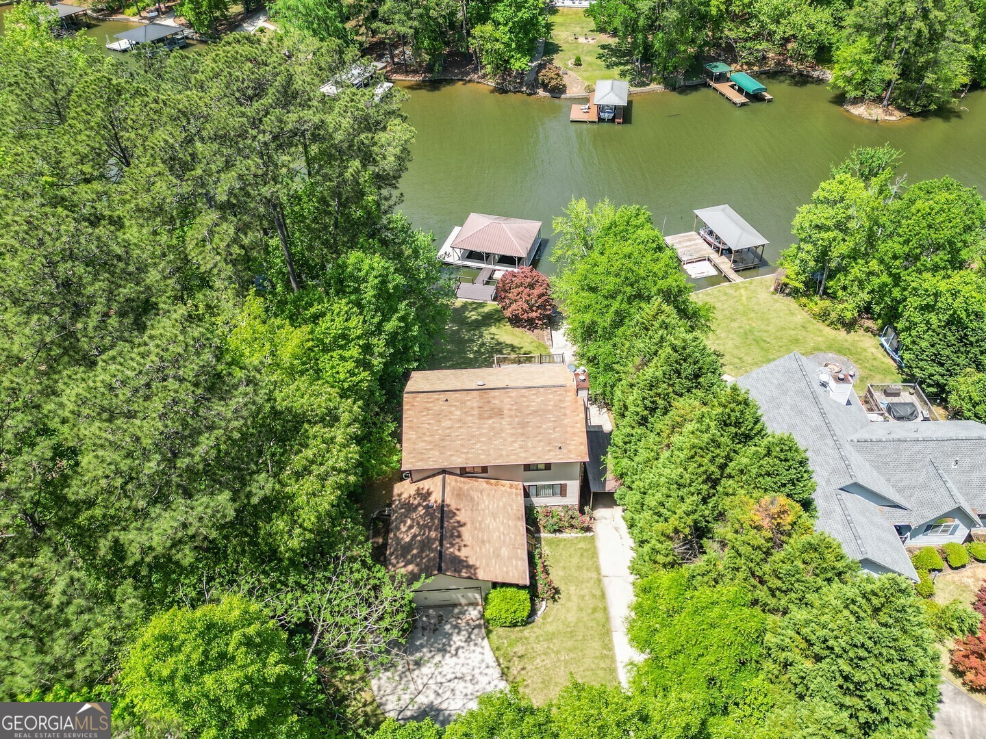 71 Canvasback Court Monticello, GA 31064 - Photo 3 of 79 an aerial view of a house with a lake view