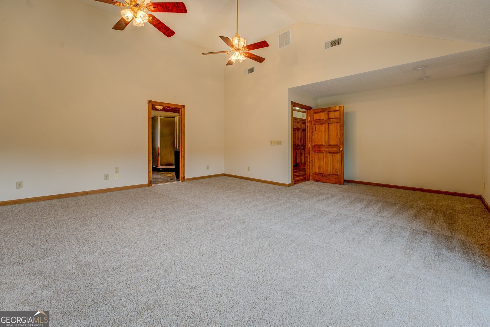 71 Canvasback Court Monticello, GA 31064 - Photo 46 of 79 a view of an empty room with a ceiling fan