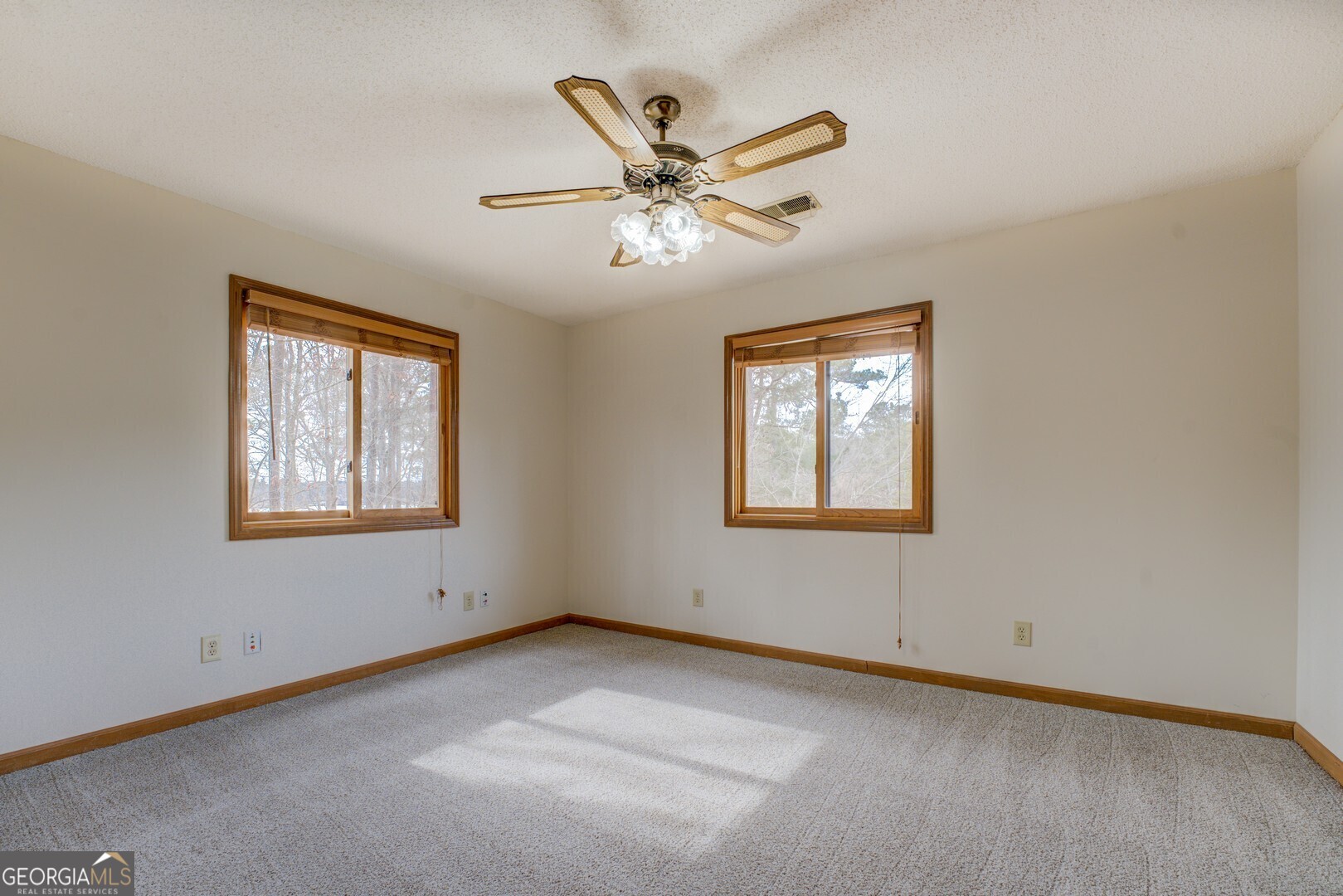 71 Canvasback Court Monticello, GA 31064 - Photo 53 of 79 a view of an empty room with a window