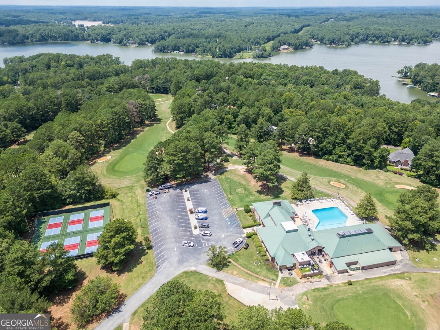 71 Canvasback Court Monticello, GA 31064 - Photo 67 of 79 an aerial view of a house with a yard and lake view