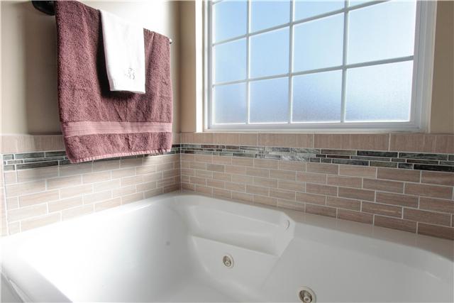 558 Windy Road Mount Juliet, TN 37122 - Photo 10 of 20 Brand New Tile Flooring in Bath and Tile Backsplash Around Tub.