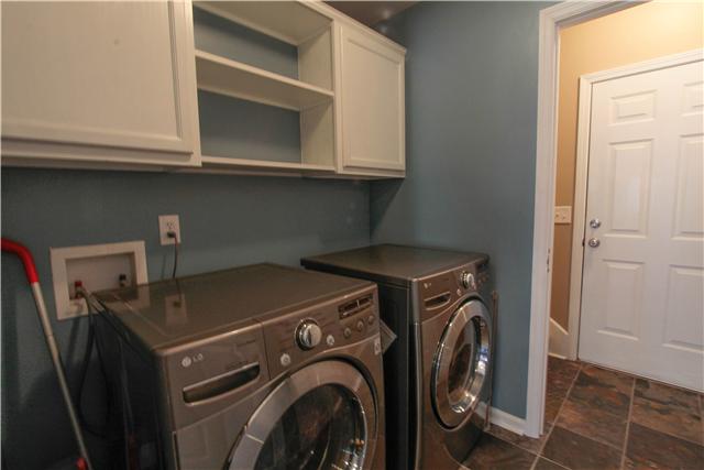 558 Windy Road Mount Juliet, TN 37122 - Photo 12 of 20 Full Utility Room off of Garage with Tile Flooring.