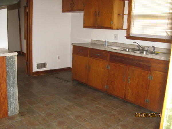 3816 Cove Road Roanoke, VA 24017 - Photo 2 of 9 a bathroom with a sink and a mirror