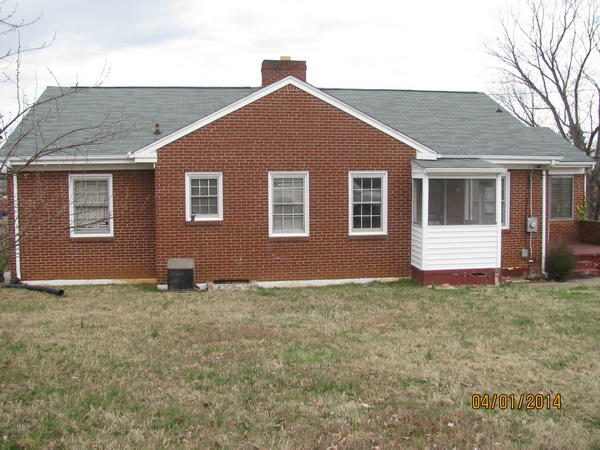 3816 Cove Road Roanoke, VA 24017 - Photo 4 of 9 a house that has a tree in front of it