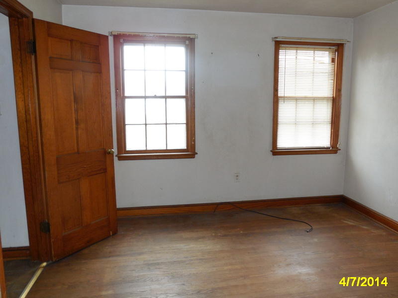 3816 Cove Road Roanoke, VA 24017 - Photo 8 of 9 an empty room with windows