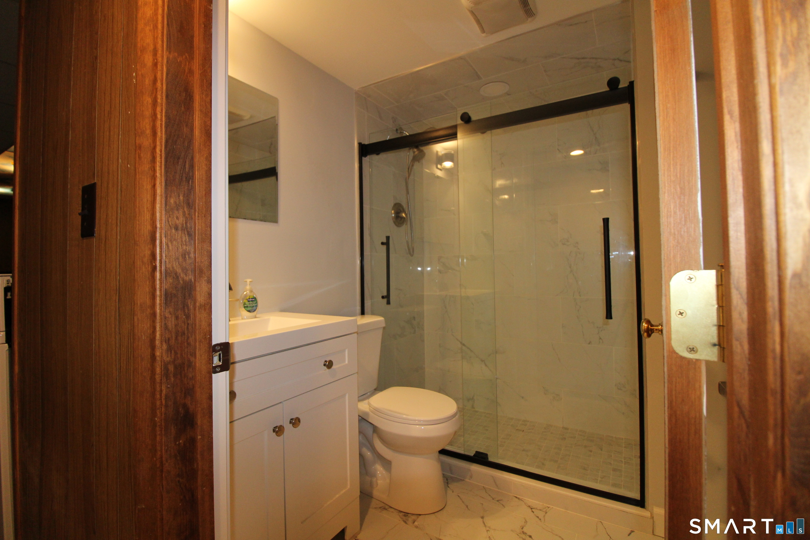 194 Cedar Swamp Road Mansfield, CT 06268 - Photo 22 of 28 Lower level bath