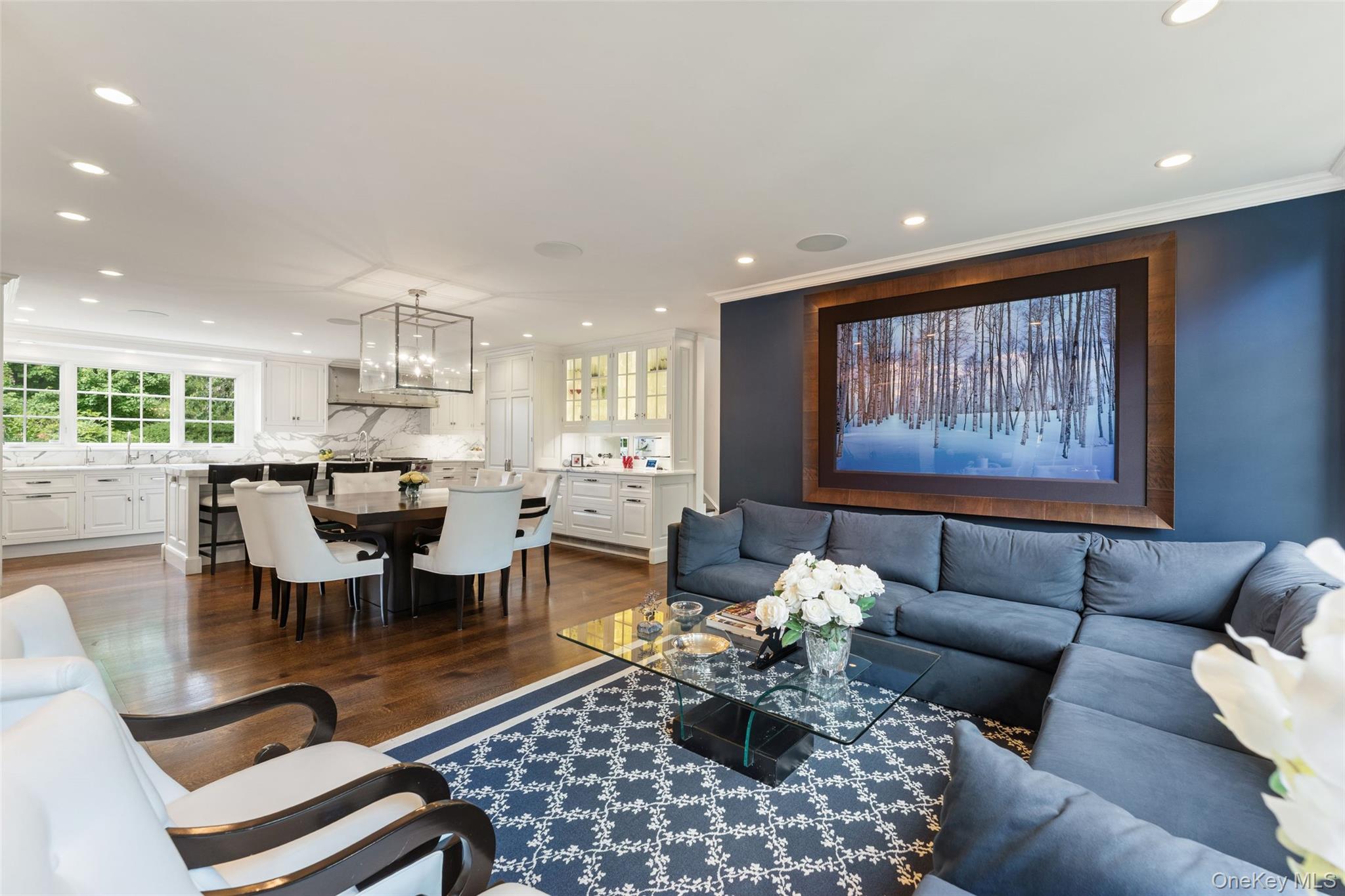 21 Dolma Road Scarsdale, NY 10583 - Photo 11 of 46 Family room with wrap around windows overlooking gardens