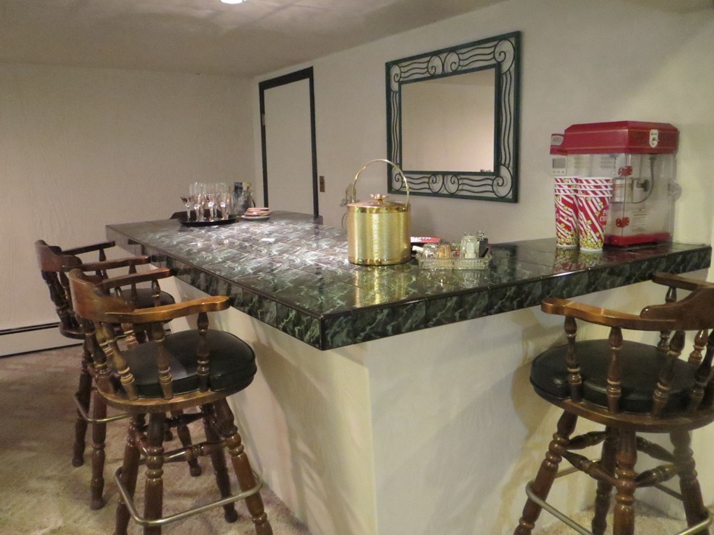 84 Genesee Street Lawrence, MA 01843 - Photo 17 of 30 a bathroom with a sink and a mirror