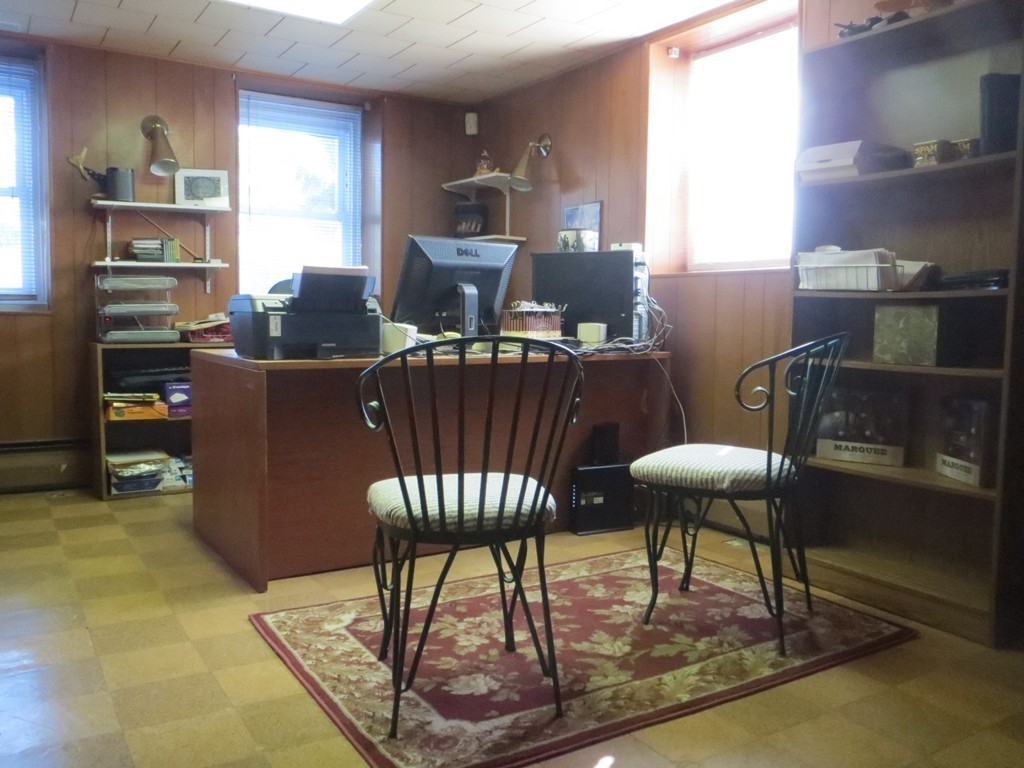 84 Genesee Street Lawrence, MA 01843 - Photo 19 of 30 a view of a dining room with furniture