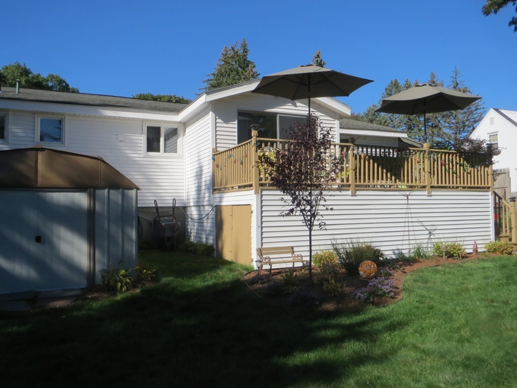 84 Genesee Street Lawrence, MA 01843 - Photo 30 of 30 a front view of a house with garden