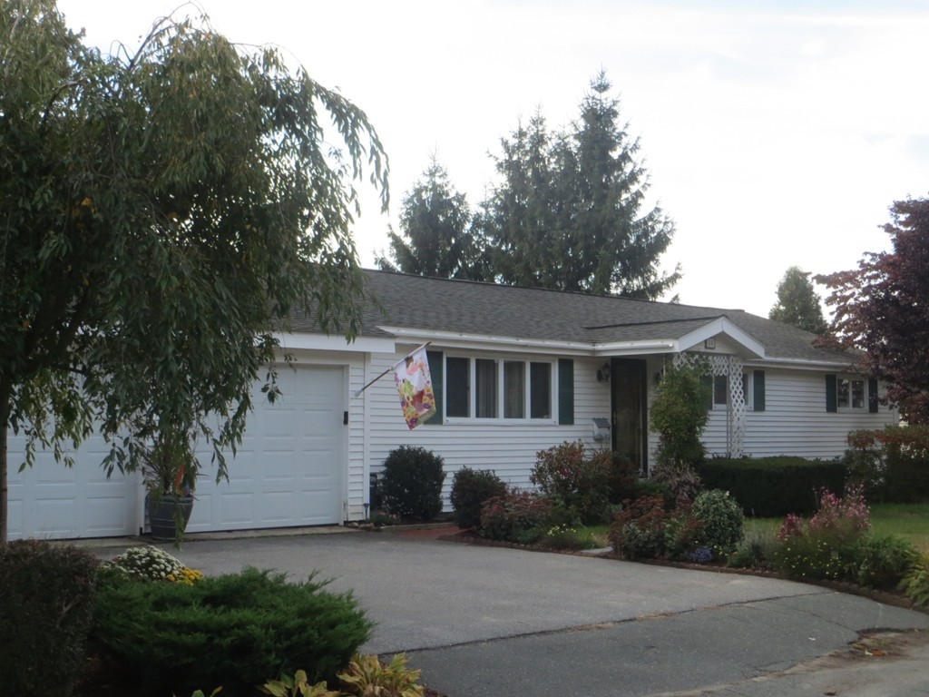 84 Genesee Street Lawrence, MA 01843 - Photo 3 of 30 front view of house with a yard