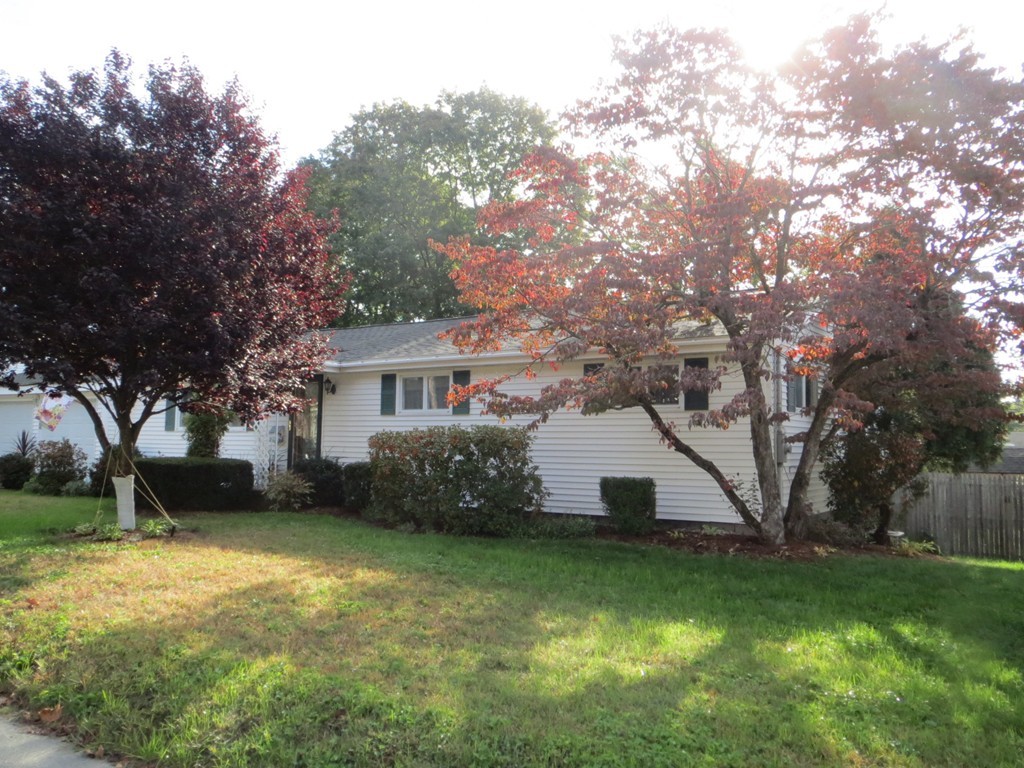 84 Genesee Street Lawrence, MA 01843 - Photo 4 of 30 a view of a house with a yard