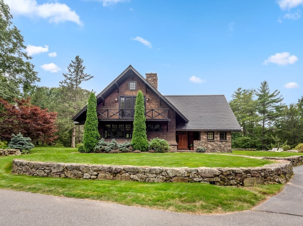 49 Greene Road Princeton, MA 01541 - Photo 1 of 42 a front view of a house with a garden