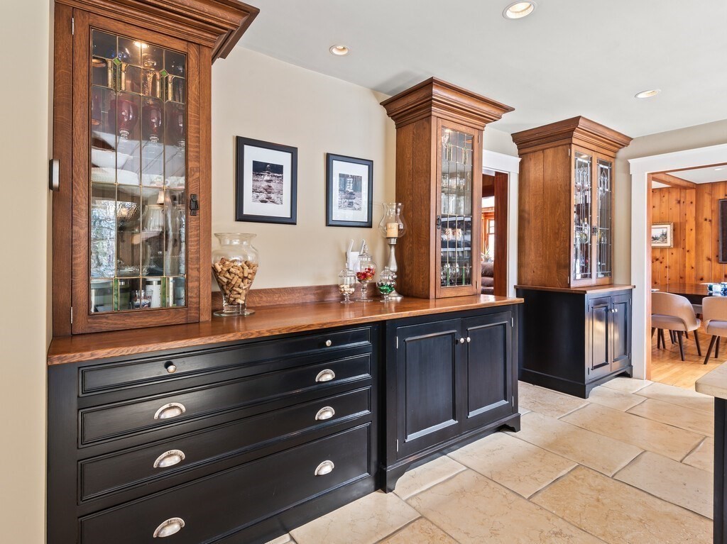49 Greene Road Princeton, MA 01541 - Photo 11 of 42 a spacious bathroom with a granite countertop double vanity and a mirror