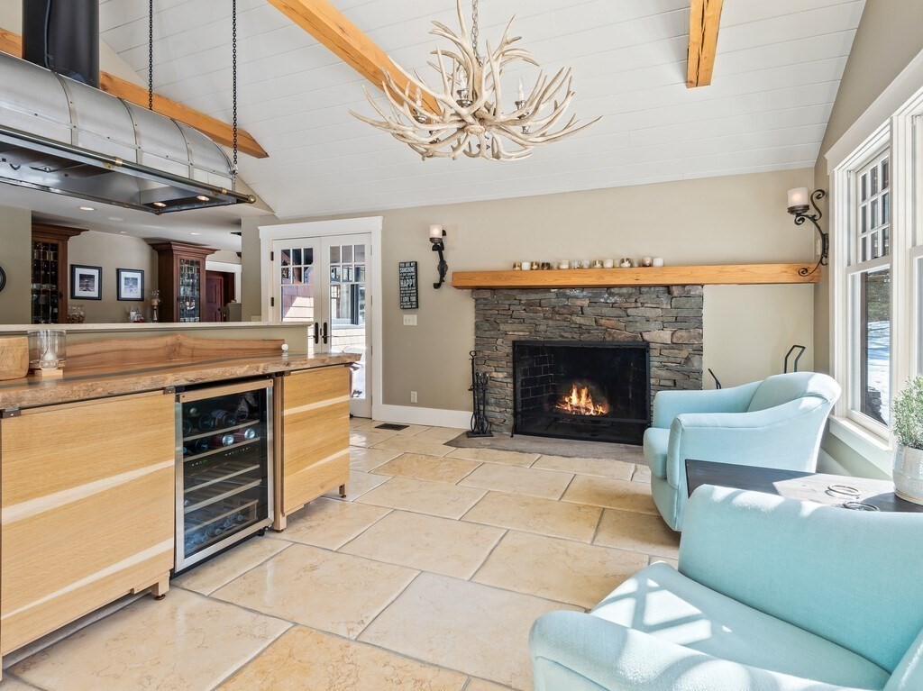 49 Greene Road Princeton, MA 01541 - Photo 14 of 42 a living room with furniture and a fireplace