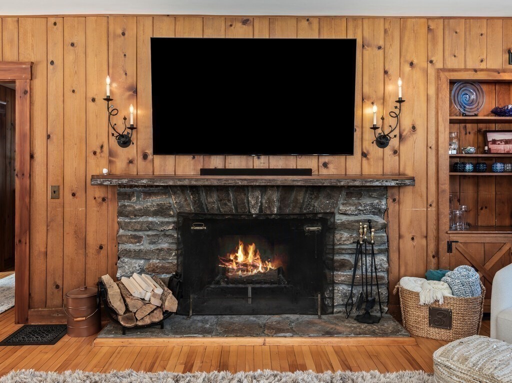 49 Greene Road Princeton, MA 01541 - Photo 22 of 42 a living room with furniture and a fireplace
