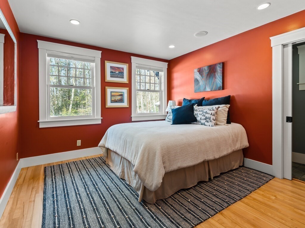 49 Greene Road Princeton, MA 01541 - Photo 23 of 42 a bedroom with a large bed and a window
