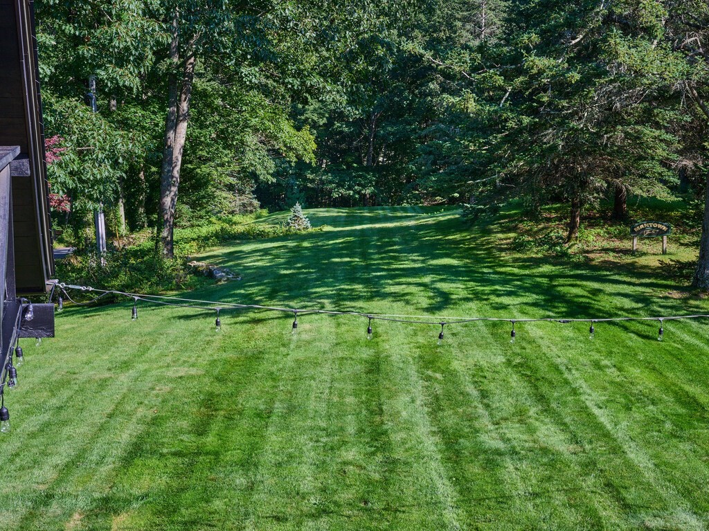 49 Greene Road Princeton, MA 01541 - Photo 41 of 42 a green field with lots of trees in it