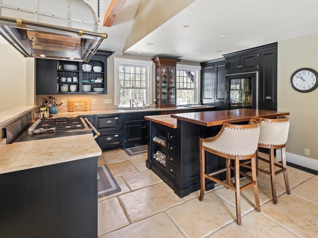 49 Greene Road Princeton, MA 01541 - Photo 8 of 42 a kitchen with stainless steel appliances granite countertop a stove a sink and a refrigerator