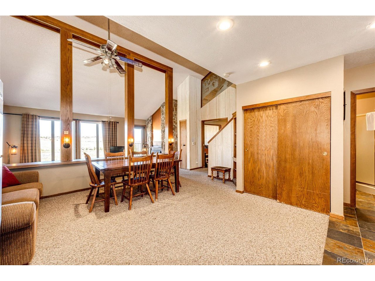 96 Mountainside Drive, Unit 47 Granby, CO 80446 - Photo 10 of 42 a dining room with furniture window and outside view