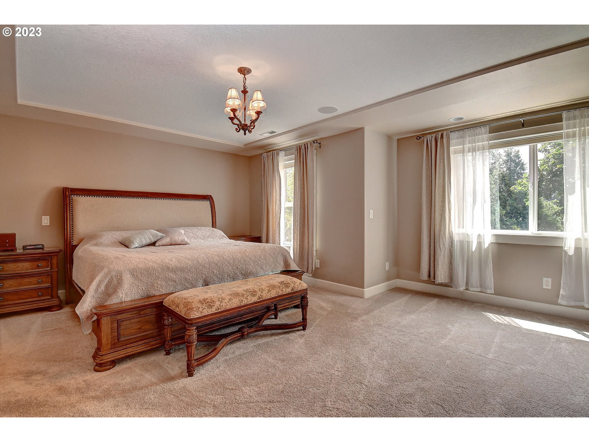 907 North 7th Circle Ridgefield, WA 98642 - Photo 18 of 47 a bedroom with a bed and window