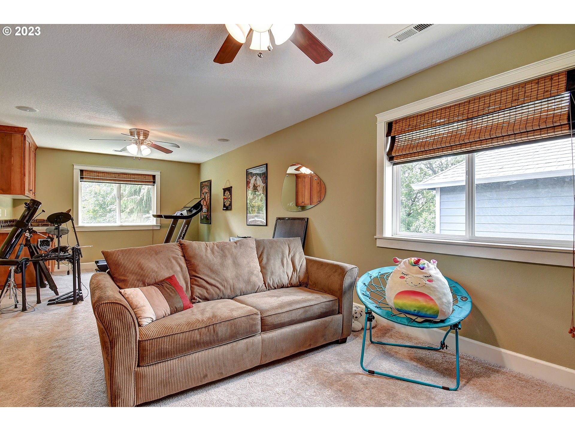 907 North 7th Circle Ridgefield, WA 98642 - Photo 29 of 47 a living room with furniture and a large window