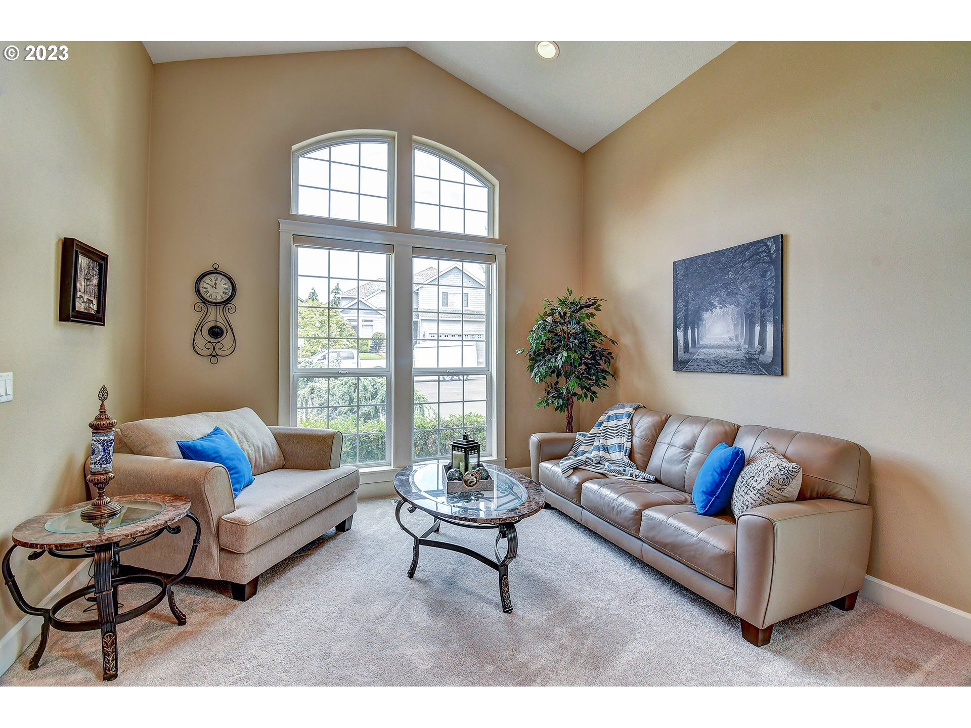 907 North 7th Circle Ridgefield, WA 98642 - Photo 5 of 47 a living room with furniture and a large window