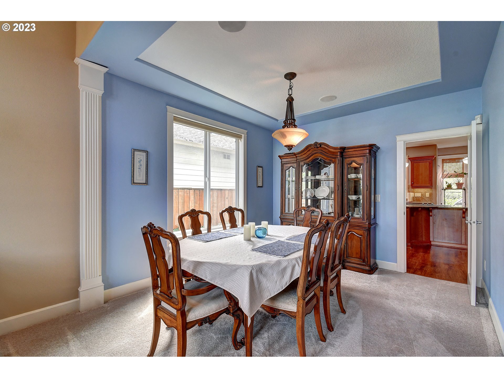 907 North 7th Circle Ridgefield, WA 98642 - Photo 6 of 47 a view of a dining room with furniture and window