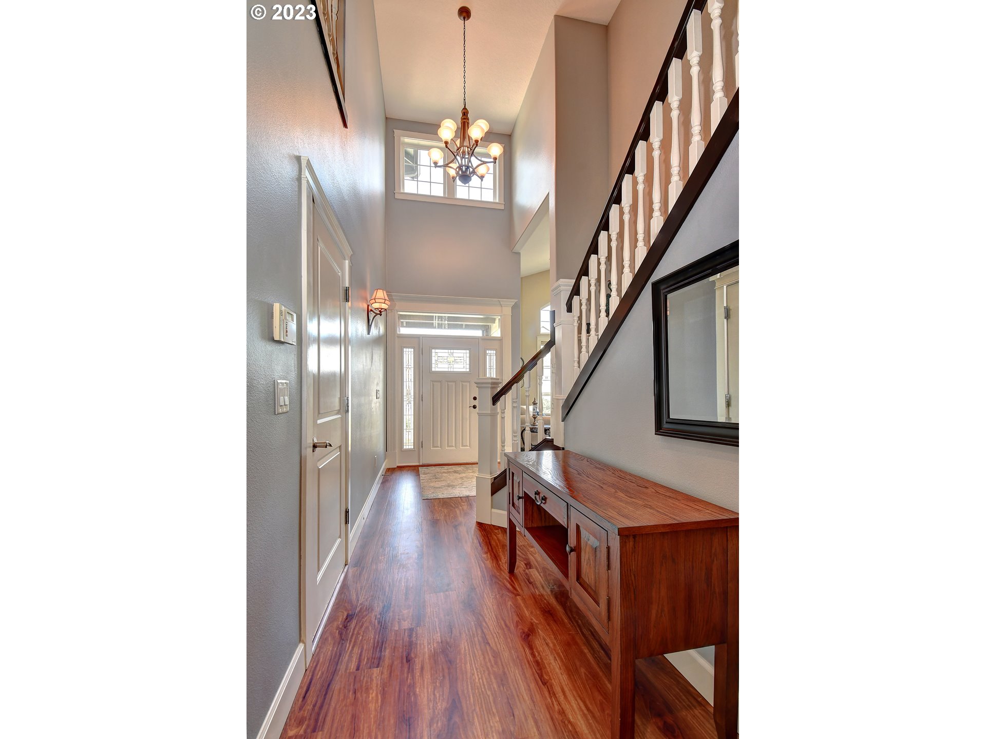 907 North 7th Circle Ridgefield, WA 98642 - Photo 8 of 47 a view of entryway and hall with wooden floor