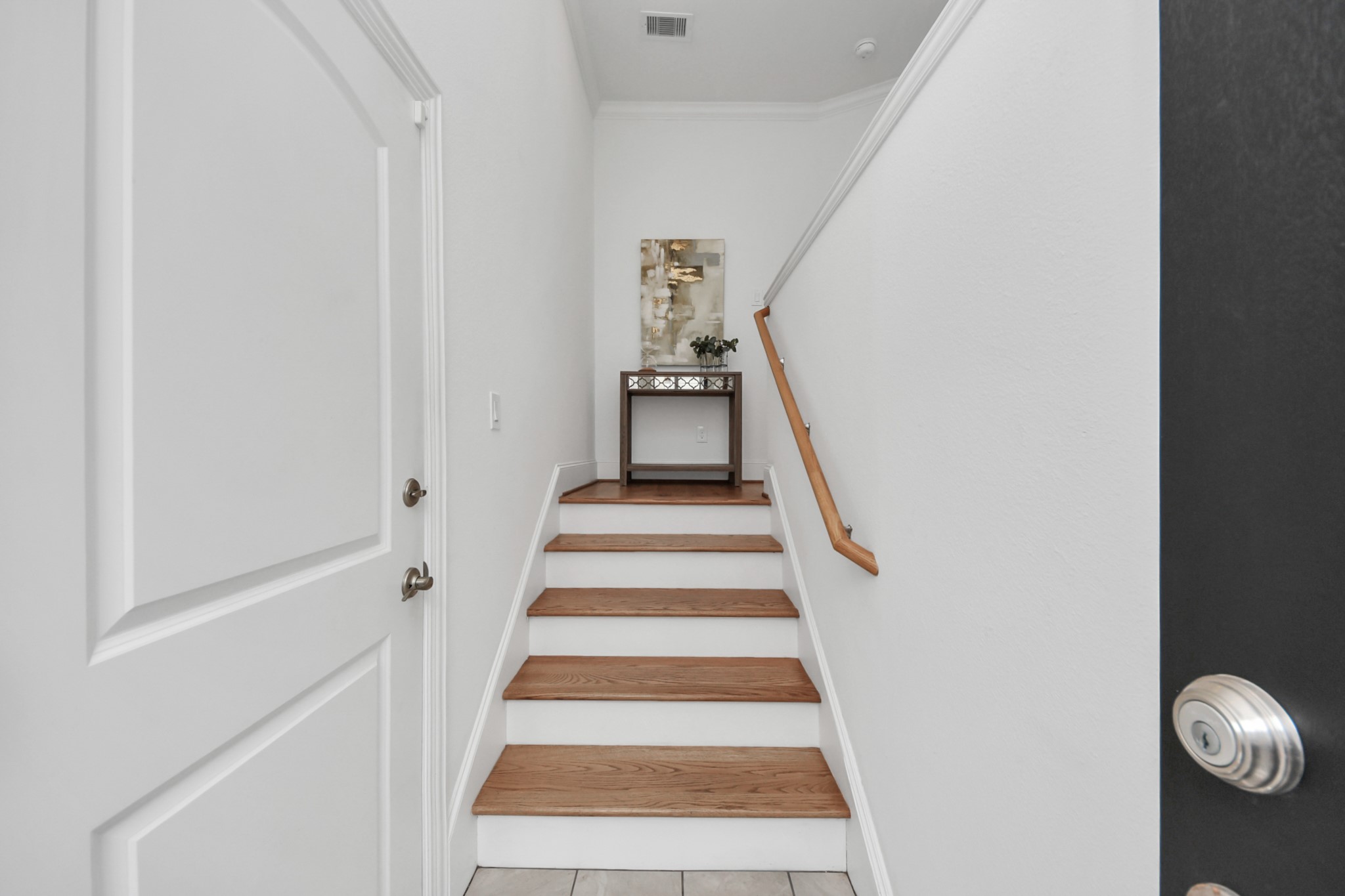1628 West 24th Street Houston, TX 77008 - Photo 8 of 41 Step into modern elegance at 1628 W 24th St, Shady Acres, where a welcoming entryway sets the tone for your dream home.