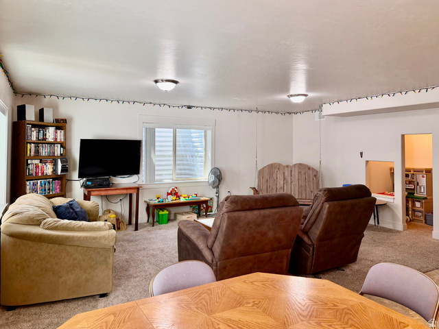 1204 South 1150th Street West Payson, UT 84651 - Photo 12 of 26 Basement Spacious room featuring neutral carpeting and white painted walls