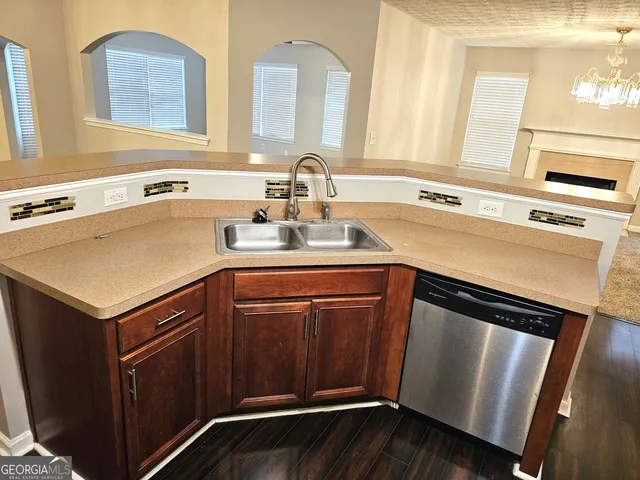 a bathroom with a glass door shower
