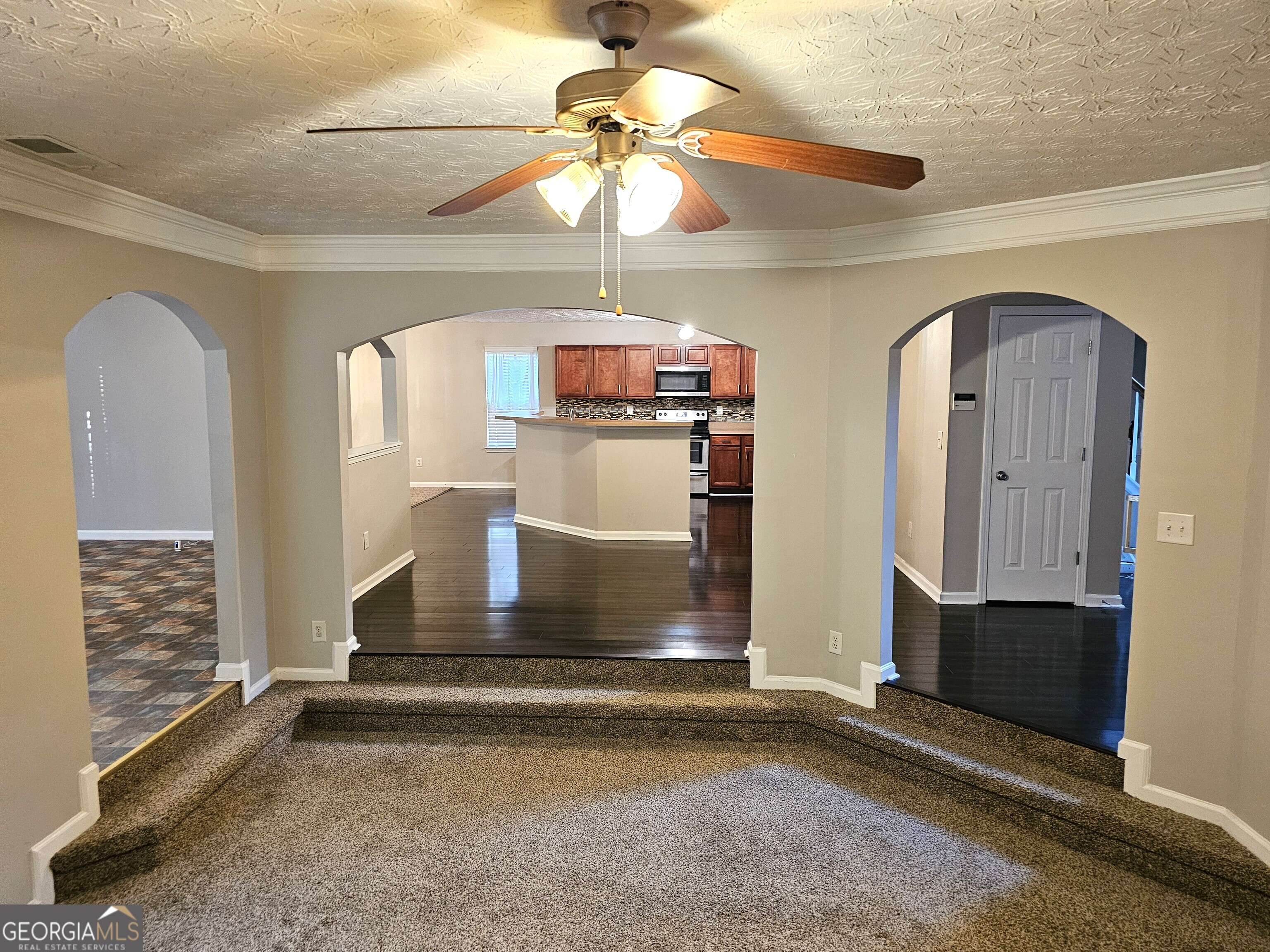11223 Genova Terrace Hampton, GA 30228 - Photo 6 of 26 a view of entryway and hall with a front door