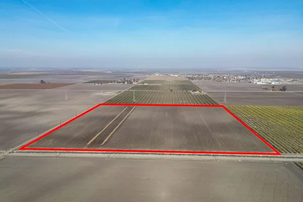 an outdoor space with lounge chair