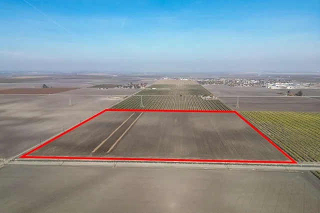 an outdoor space with lounge chair