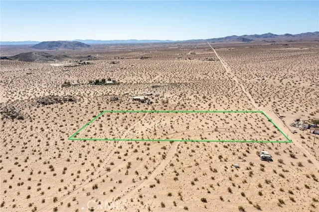 5900 Kickapoo Landers, CA 92285 - Photo 14 of 14 a view of an ocean beach and mountain