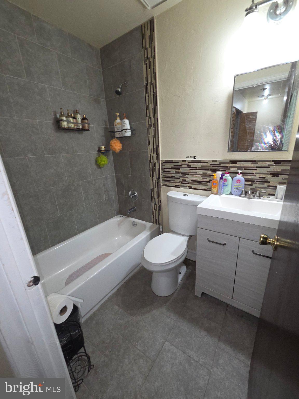 27 Berkshire Road Sicklerville, NJ 08081 - Photo 5 of 7 Modern bathroom with stylish tiles.