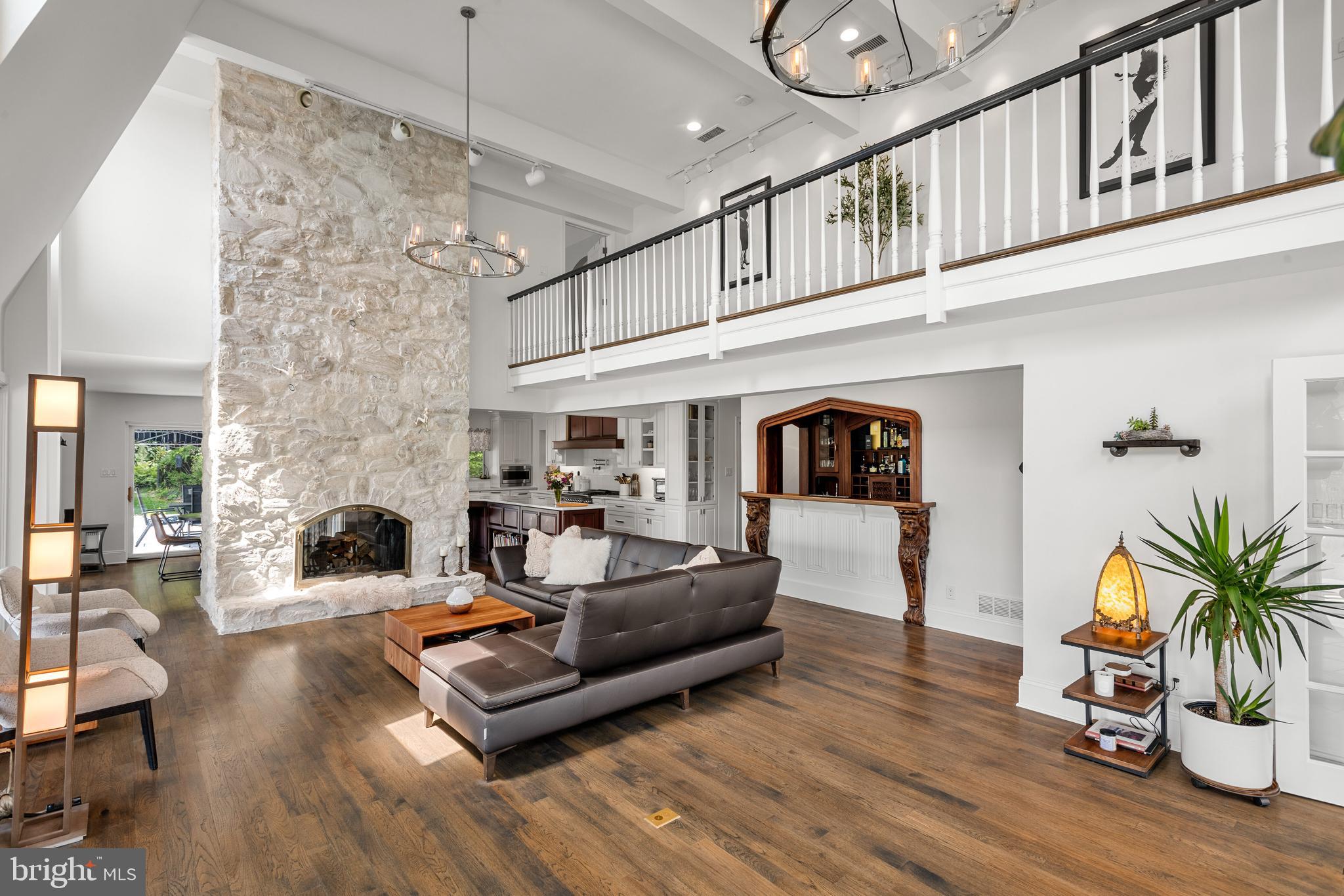 238 Ravenscliff Road Wayne, PA 19087 - Photo 17 of 74 a living room with furniture and a fireplace