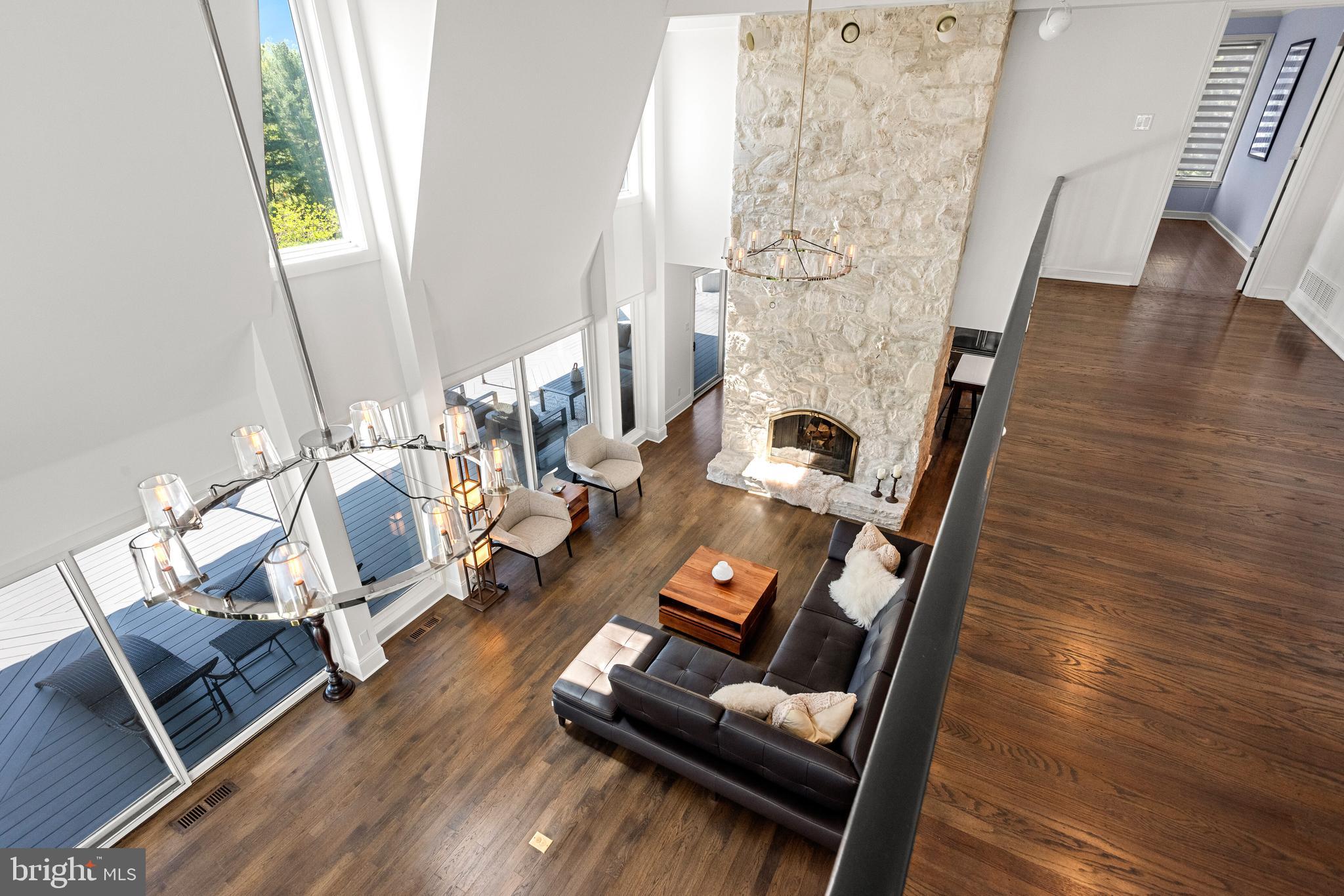 238 Ravenscliff Road Wayne, PA 19087 - Photo 23 of 74 a view of living room with furniture and wooden floor