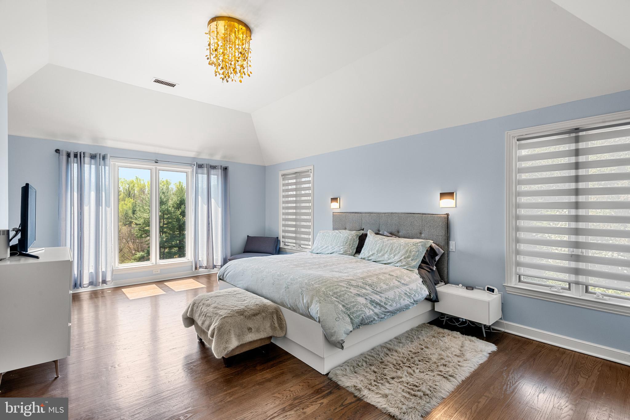 238 Ravenscliff Road Wayne, PA 19087 - Photo 39 of 74 a bedroom with a bed a couch and a window