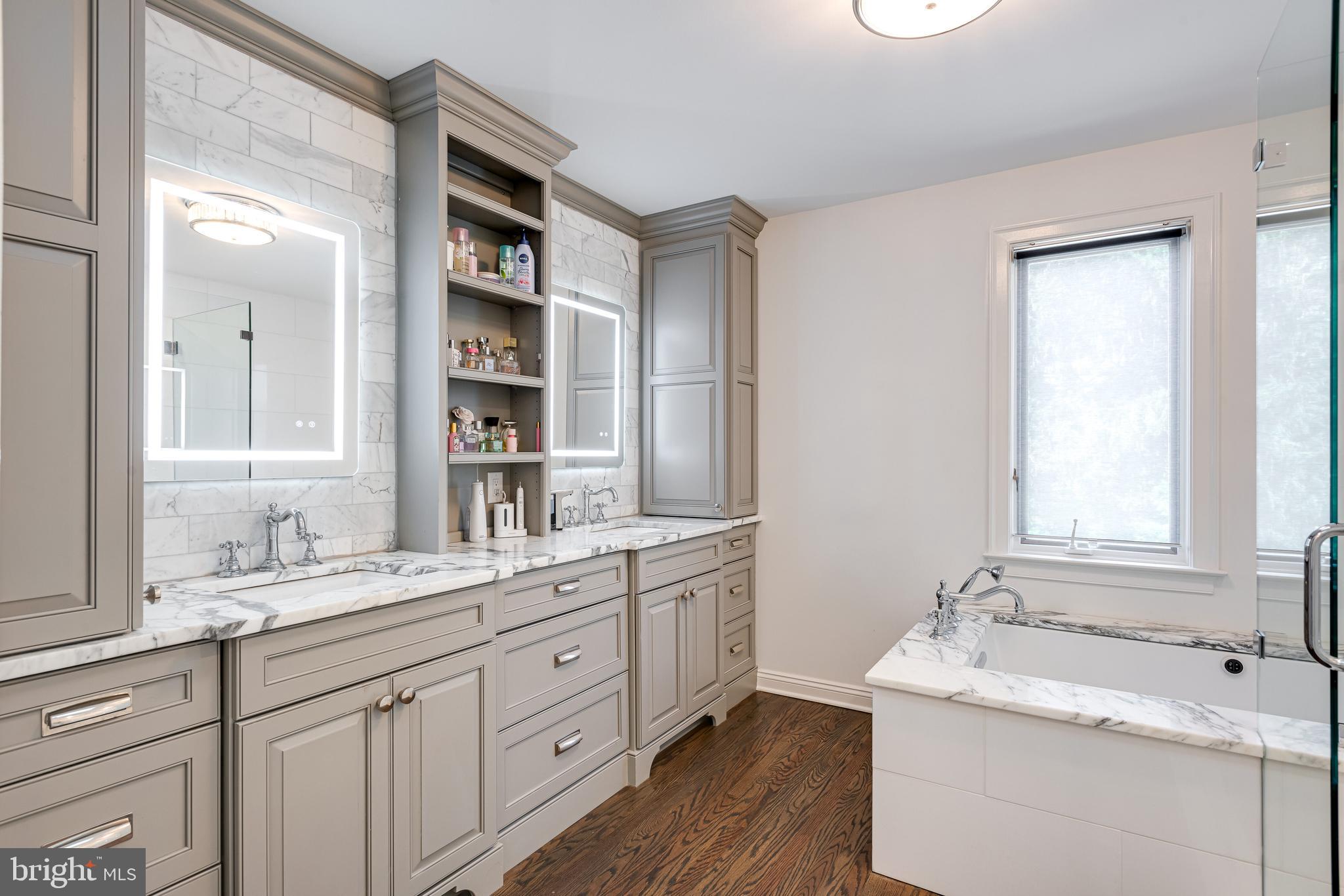 238 Ravenscliff Road Wayne, PA 19087 - Photo 43 of 74 a bathroom with a double vanity sink mirror and double