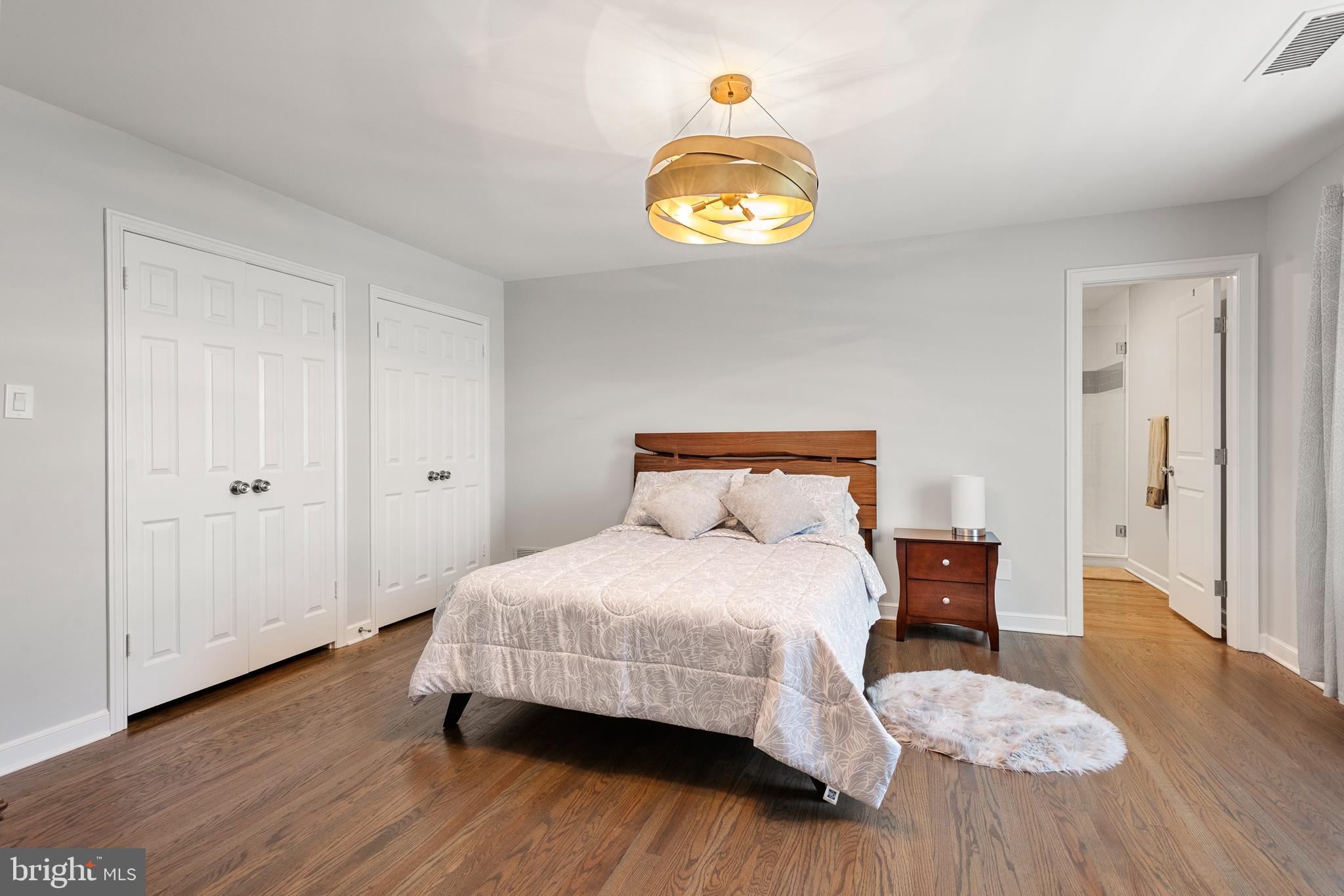 238 Ravenscliff Road Wayne, PA 19087 - Photo 46 of 74 a bedroom with a bed and a table in it