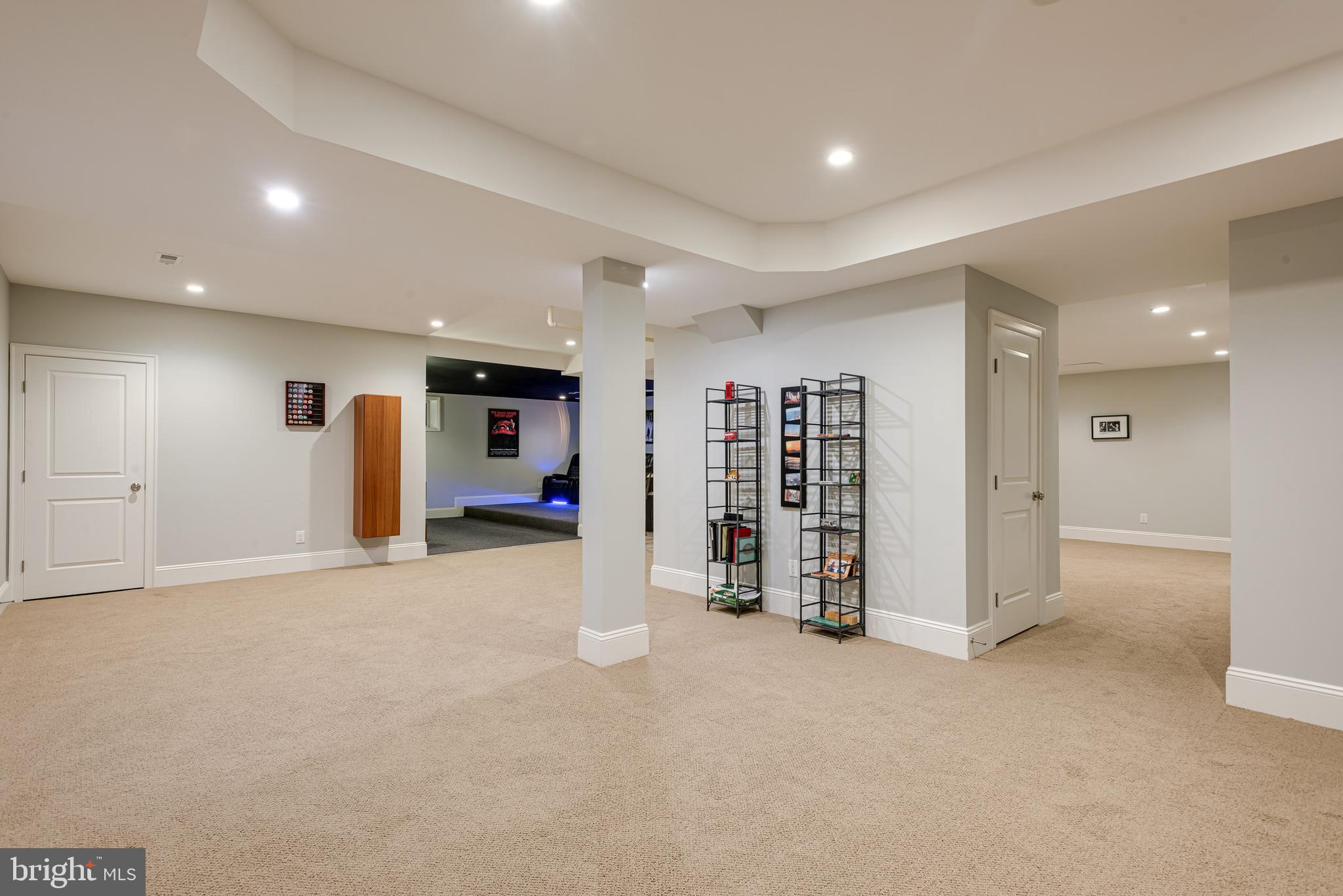 238 Ravenscliff Road Wayne, PA 19087 - Photo 53 of 74 an empty room with a cabinet and mirrors