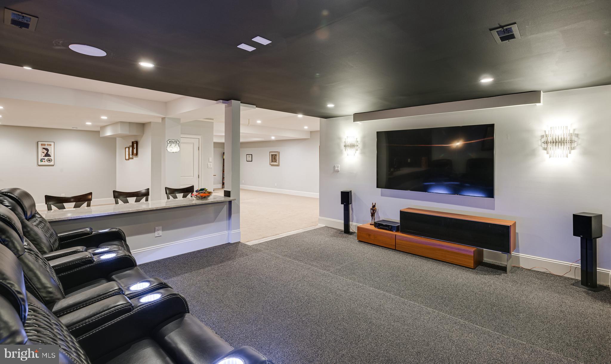 238 Ravenscliff Road Wayne, PA 19087 - Photo 57 of 74 a living room with furniture and a flat screen tv