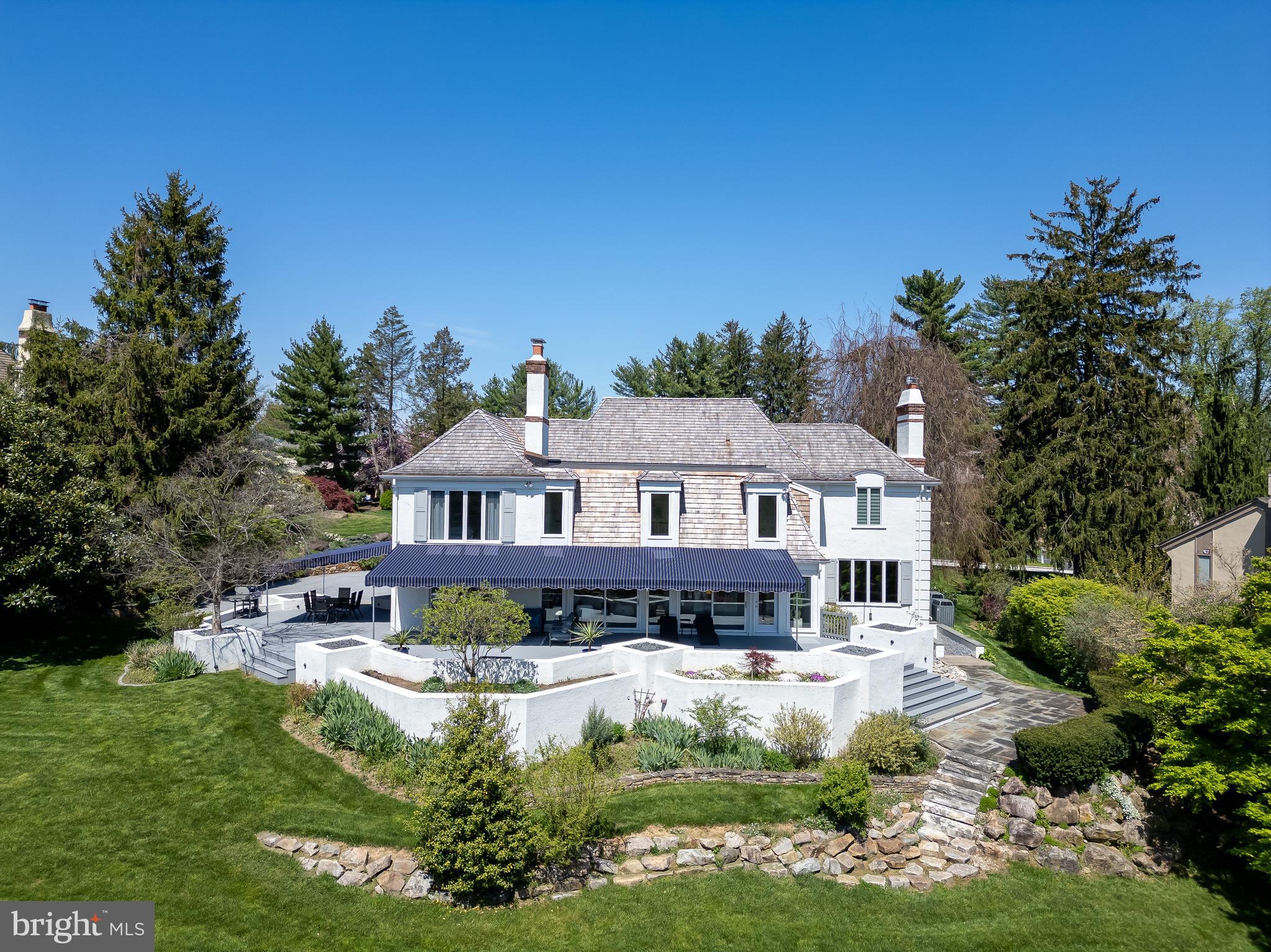 238 Ravenscliff Road Wayne, PA 19087 - Photo 6 of 74 a front view of a house with a yard