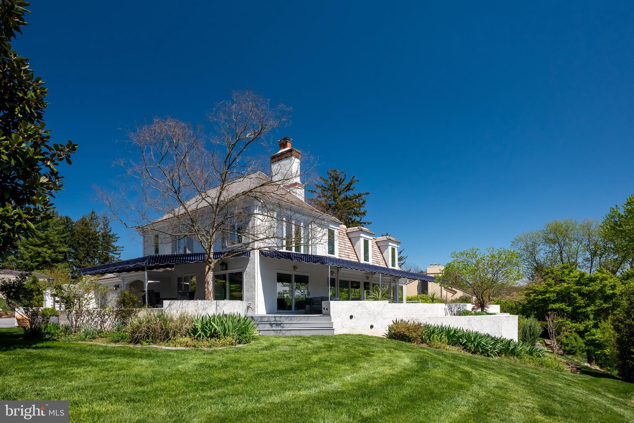 238 Ravenscliff Road Wayne, PA 19087 - Photo 67 of 74 a view of a house with a garden