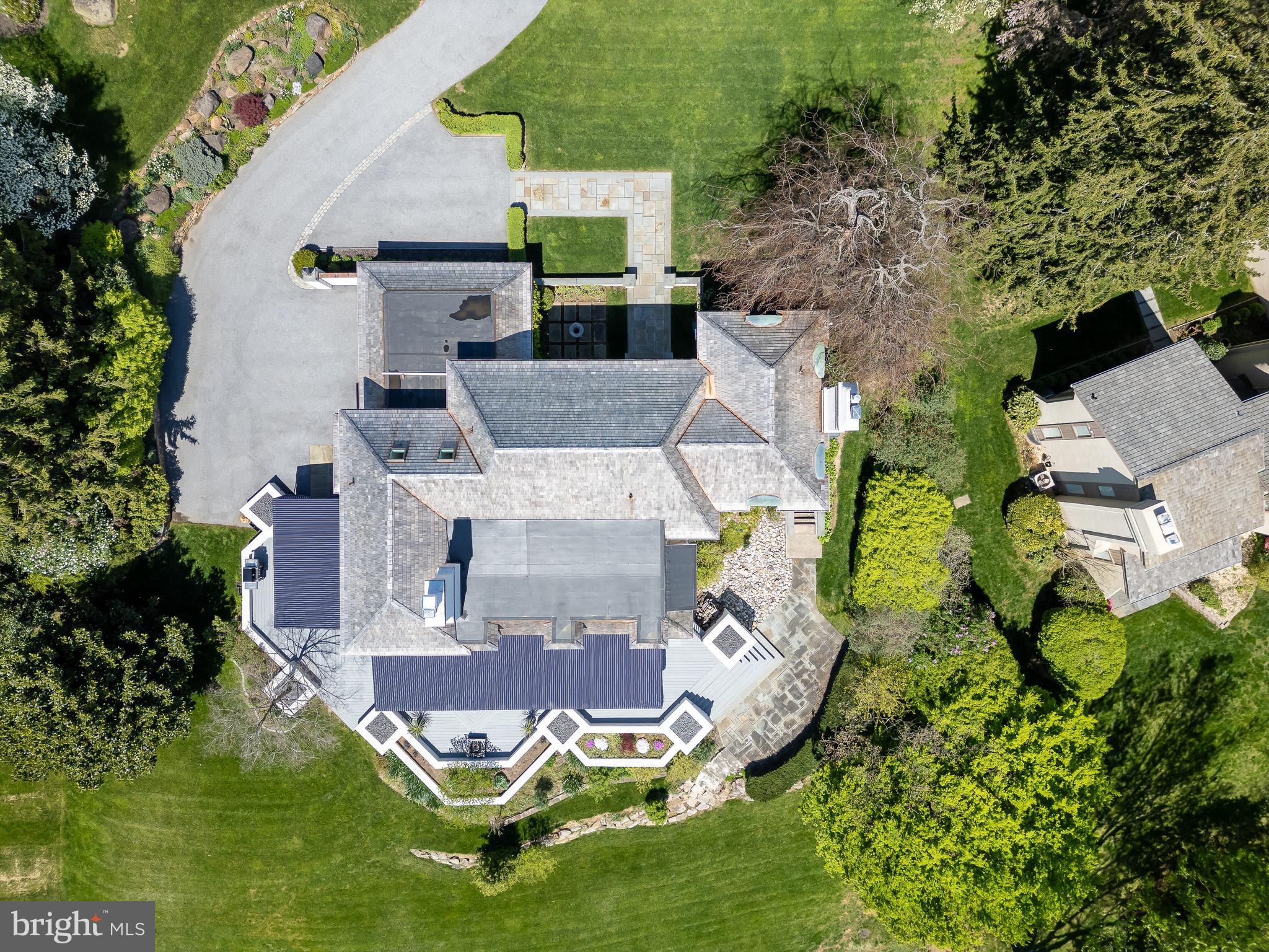 238 Ravenscliff Road Wayne, PA 19087 - Photo 70 of 74 an aerial view of a house with swimming pool a yard and outdoor seating