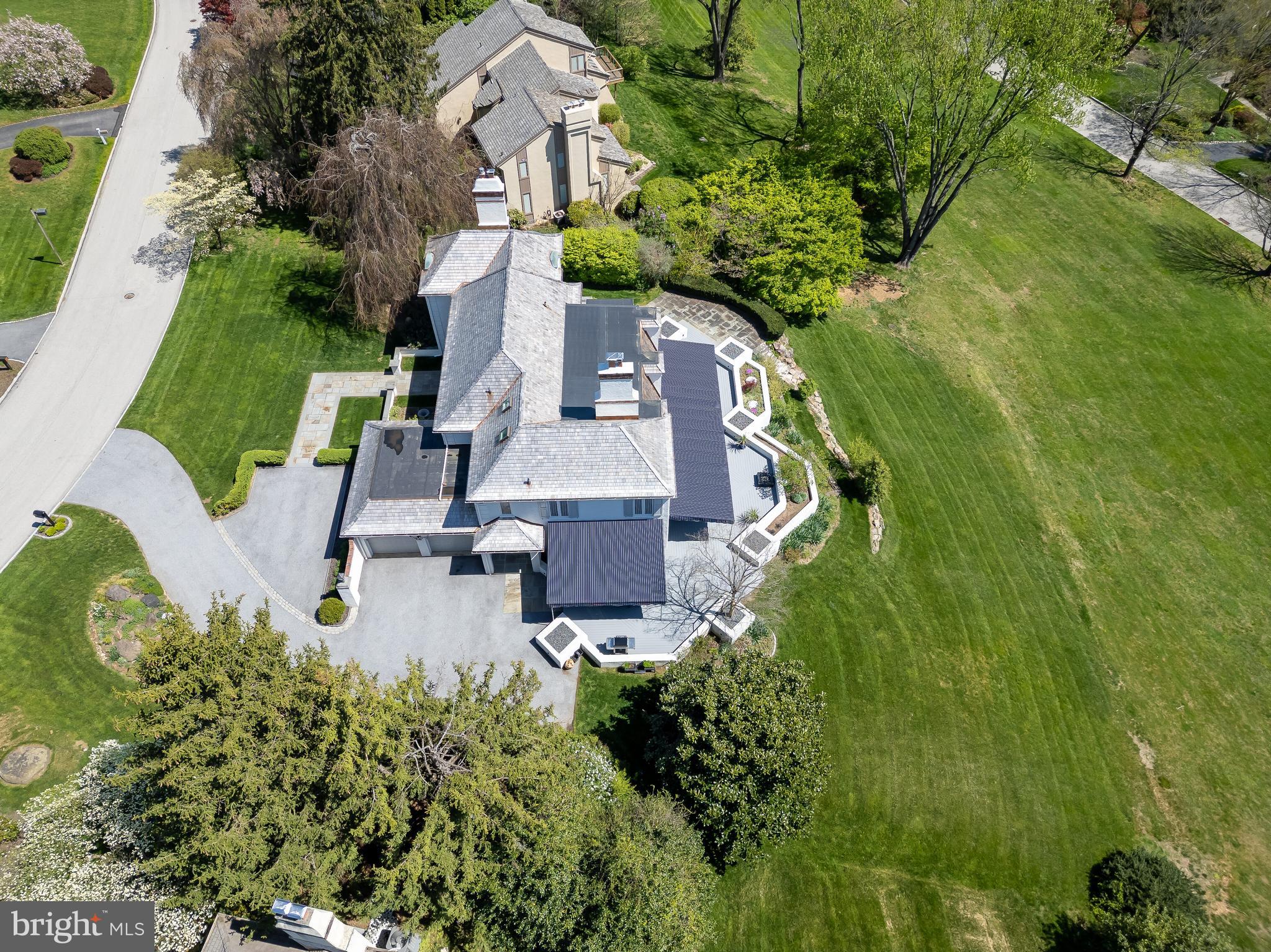 238 Ravenscliff Road Wayne, PA 19087 - Photo 72 of 74 an aerial view of a house with garden space and street view