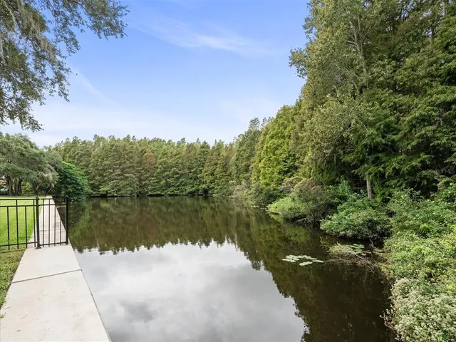 a view of entryway and hall with a rug
